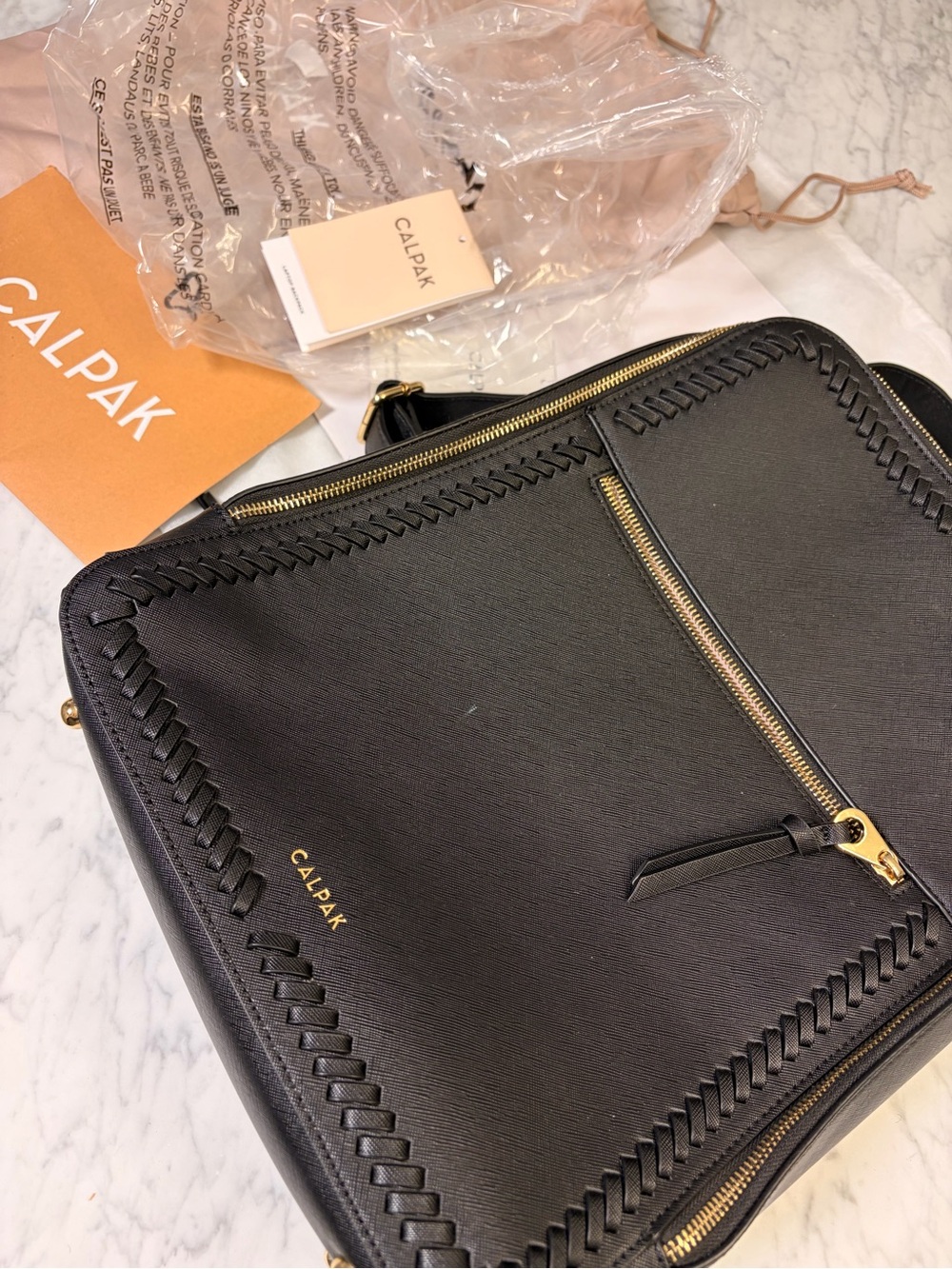 Calpak Black Leather Backpack with Gold Hardware